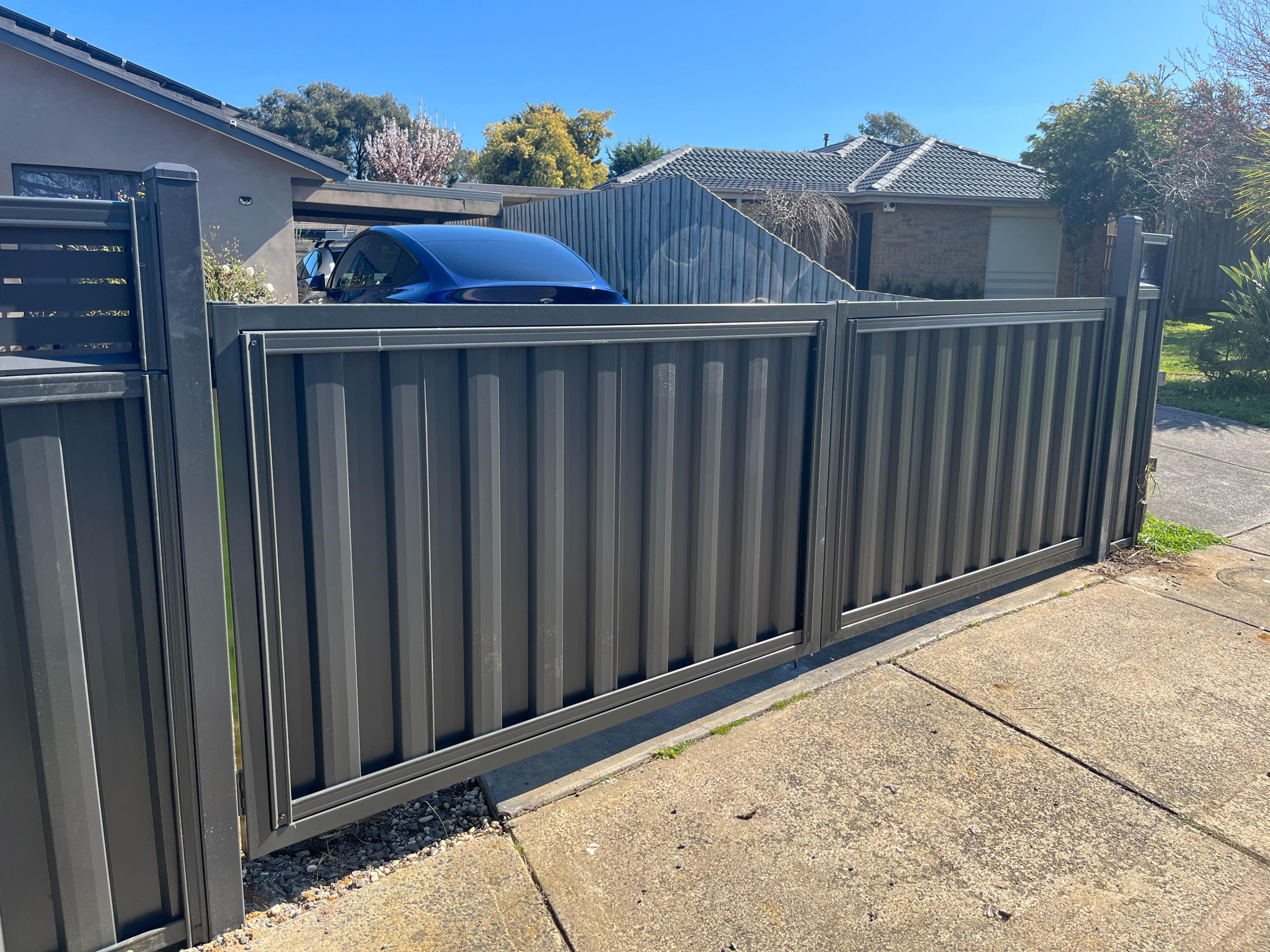 Colorbond Double Driveway Gate Installation in Narre Warren Colorbond double driveway gates Monument colour installed in Narre Warren