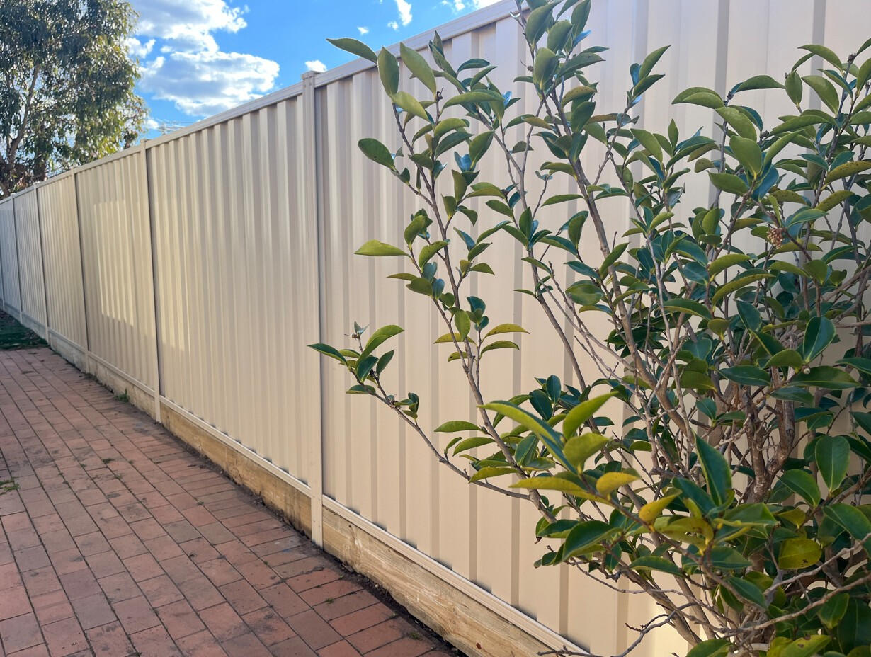 Colorbond fence with timber sleepers Paperbark colour installed in Narre Warren South